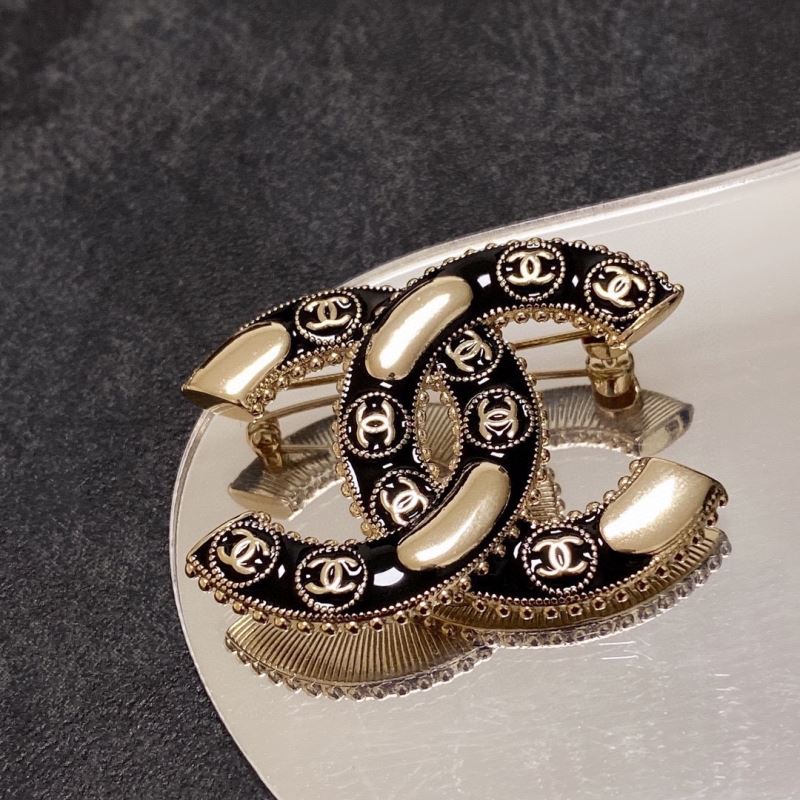Ch**el brooches
